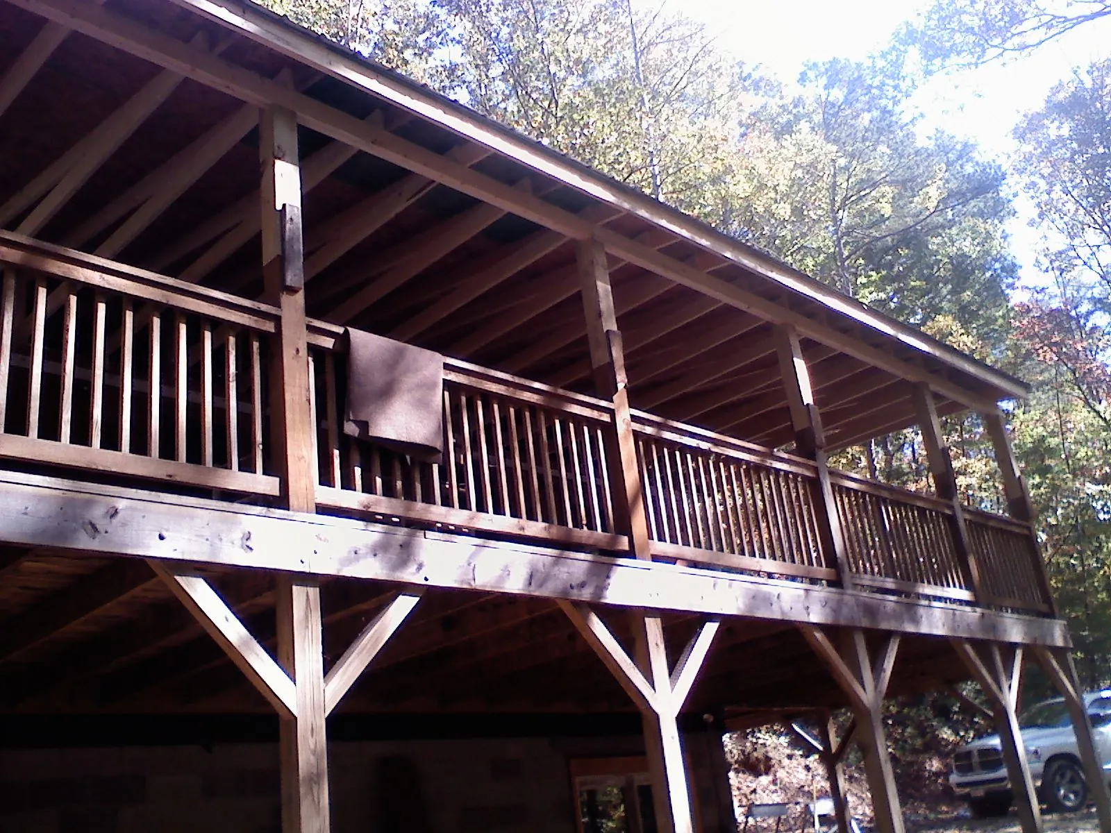 Timber framing under a new elevated porch and deck — Roof Leak Repair in South Holland by Roofing Brothers